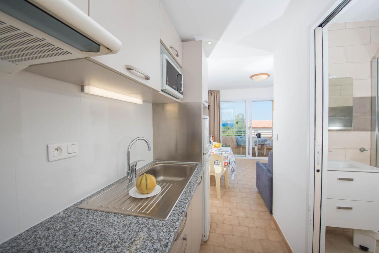 Residence Arinella ลูมิโอ ภายนอก รูปภาพ
